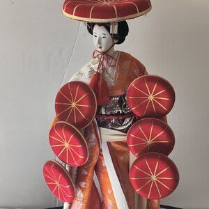 Geiesha Hat Dancer Elegantly Robed and adorned with 7 hats. Beautifully handmade